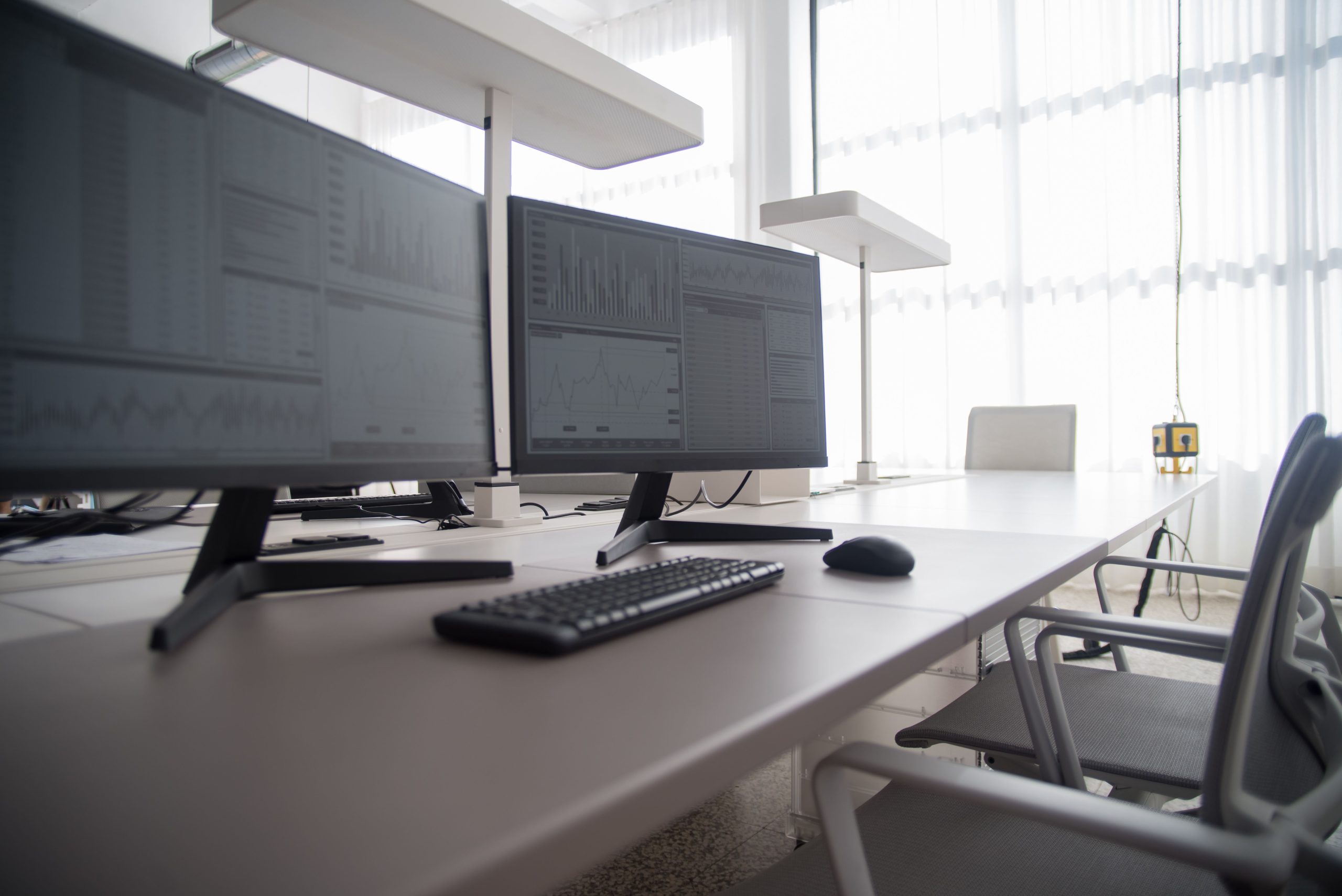 Workspace with two monitors used to track referral traffic after the Google AI Mode changes